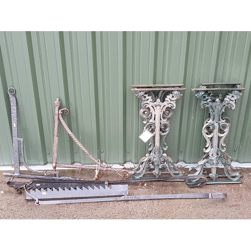 87 - Two pairs of green painted cast iron Table Ends, two Sways and two Pot Hangers