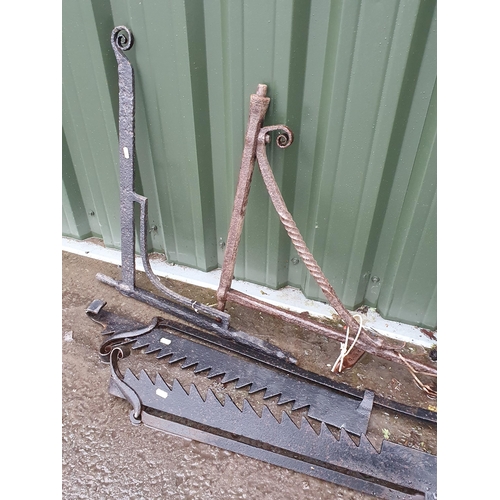 87 - Two pairs of green painted cast iron Table Ends, two Sways and two Pot Hangers