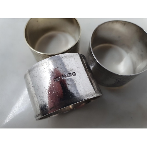 107 - A George V heavy silver Napkin Ring engraved initials, Birmingham 1932, 60gms, two other silver Ring... 