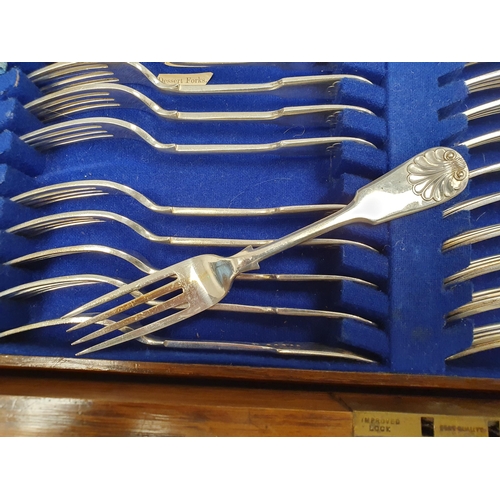 128 - A part canteen of plated Cutlery fiddle and shell pattern,  approx 100 pieces, plus associated knive... 