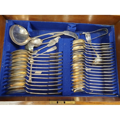 128 - A part canteen of plated Cutlery fiddle and shell pattern,  approx 100 pieces, plus associated knive... 