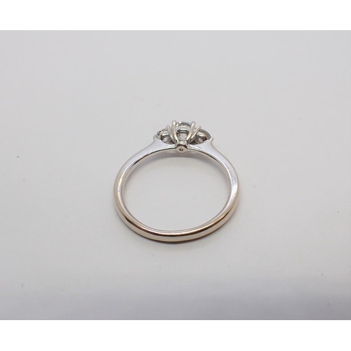 168 - A Diamond three stone Ring claw-set graduated brilliant-cut stones in 18ct white gold, ring size J -... 