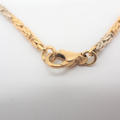 176 - An Italian white and yellow 18ct gold fancy link Necklace, approx 44cms long, approx 24.50gms