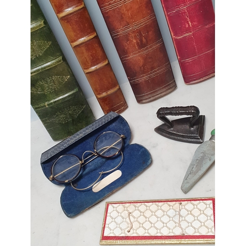 223 - Faux Bookends, a pair of Spectacles in case, a small Iron, Sharpening Stone, etc. (R9).