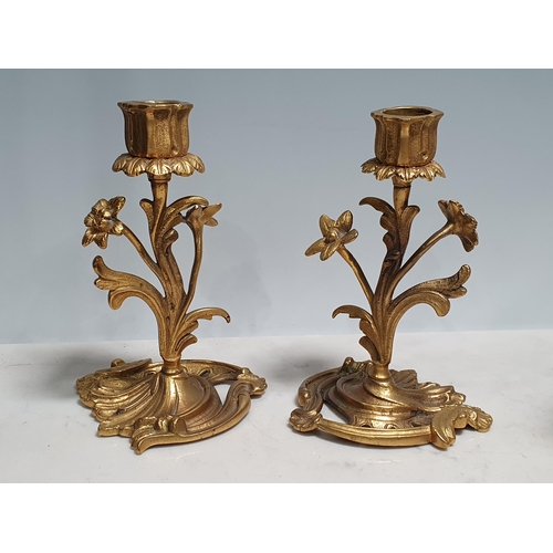 237 - A pair of two branch gilt metal Candelabrum with leaf and branch designs and a small pair of brass c... 