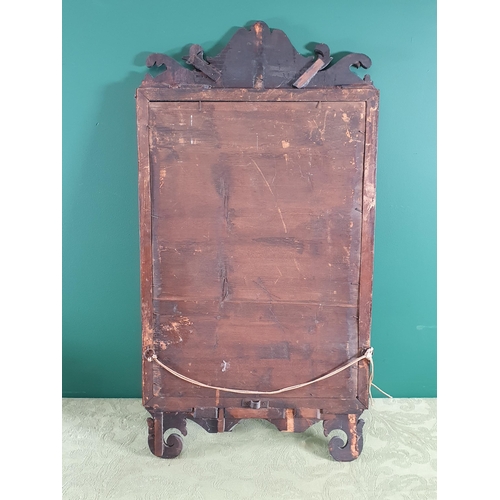 283 - A Georgian mahogany wall Mirror with fret carved frame and gilt slip, 2ft 6in H A/F