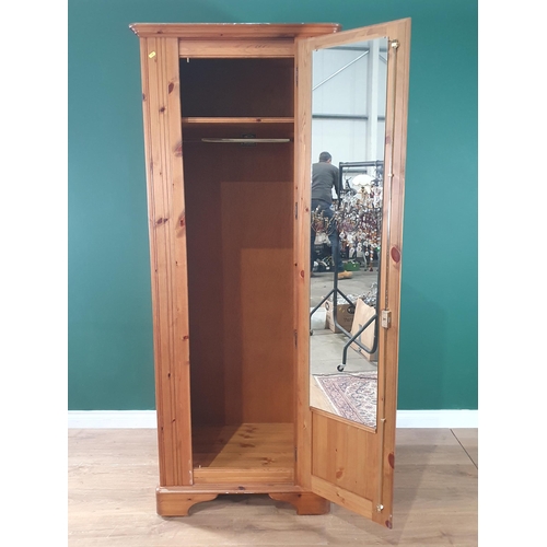 3 - A modern pine single door Wardrobe, label for 