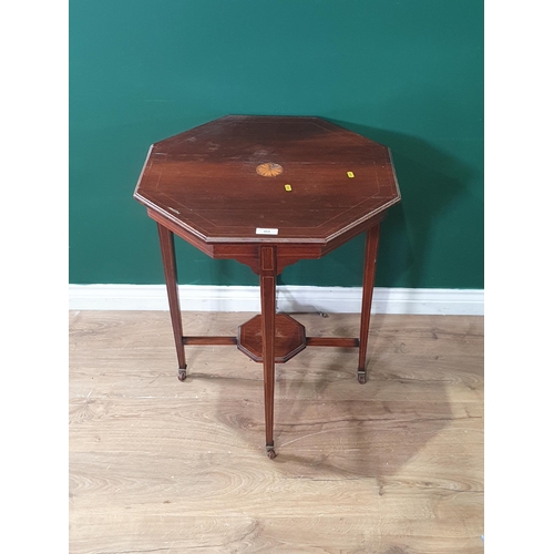 484 - A rosewood Octagonal two tier Occasional Table with inlaid motif, raised on tapered supports and cas... 