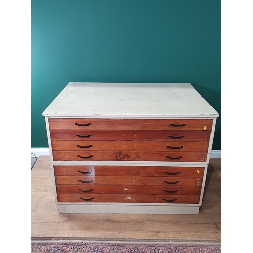 495 - A white painted two section eight drawer Plan Chest on plinth base, 3ft 1