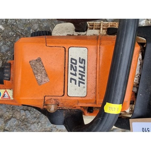 510 - A Stihl 021C petrol Chainsaw and Florabest Chain Sharpener