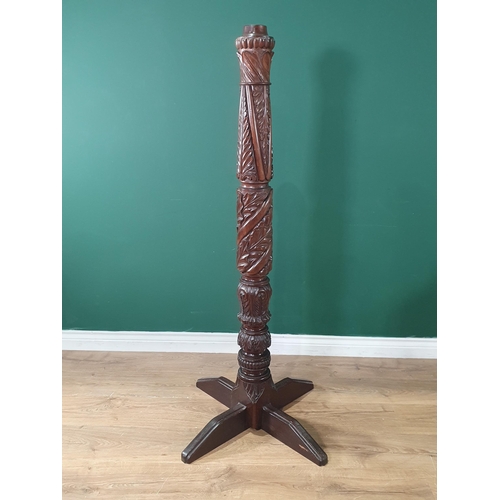 526 - A carved mahogany Lamp base or Torchiere stand with carved leafage designs, 4ft 7