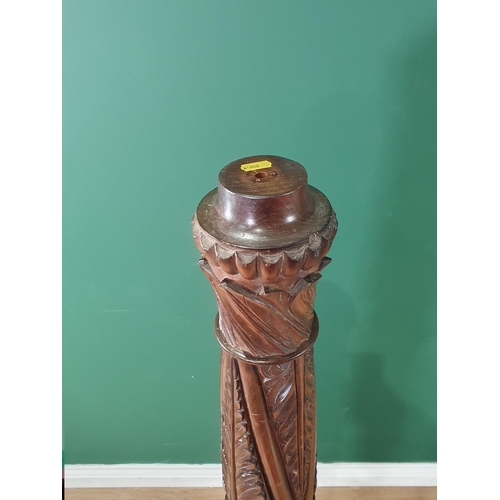 526 - A carved mahogany Lamp base or Torchiere stand with carved leafage designs, 4ft 7