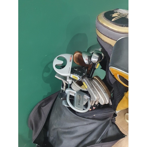 529 - A quantity of assorted Golf Clubs and Putters in blue Powakaddy Bag, assorted makers/brands. (R6).