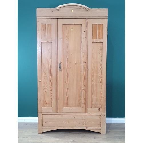 546 - A pine single door Wardrobe with shaped top, 6ft 8in H (R5)