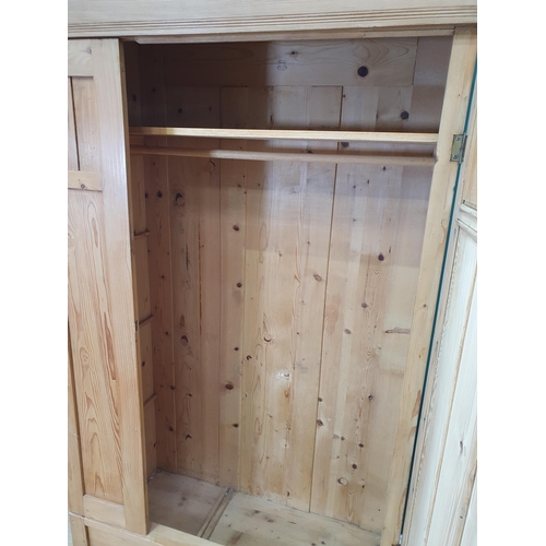 546 - A pine single door Wardrobe with shaped top, 6ft 8in H (R5)