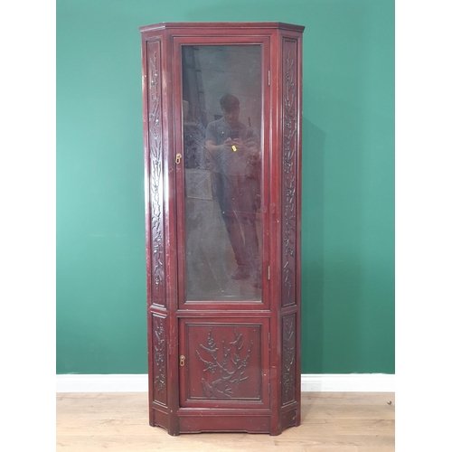 549 - A Chinese hardwood Standing Corner Cupboard with glazed door, above panel door with bird and floral ... 