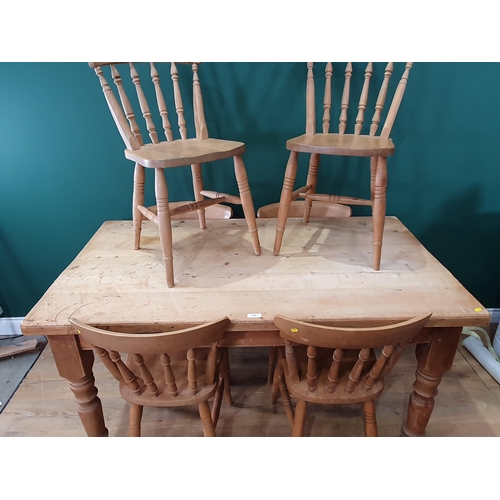 558 - A pine Kitchen Table with two fitted drawers on turned supports, 2ft 7