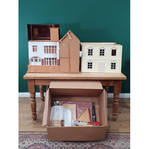 559 - Two Dolls Houses and some Furniture and Accessories. (R7).