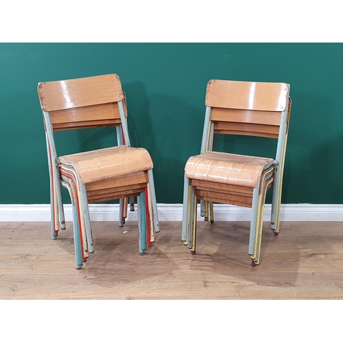 560 - A set of ten painted Childs Stacking Chairs. (R7).