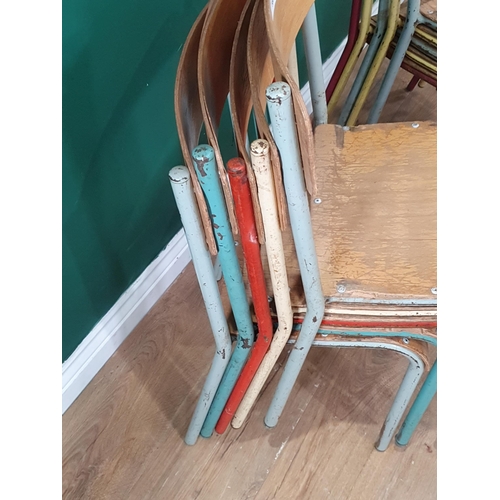 560 - A set of ten painted Childs Stacking Chairs. (R7).