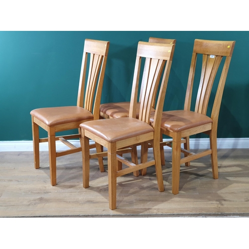 578 - A set of four modern Dining Chairs with upholstered seats. (R8).