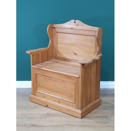 580 - A pine box seated Monks Bench, 3ft 2