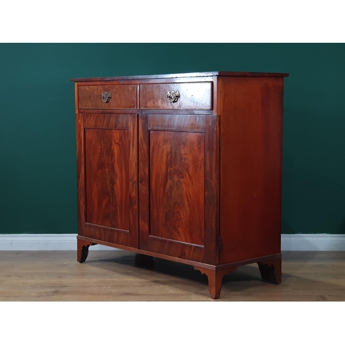 585 - A Victorian mahogany Cupboard, fitted frieze drawer and a pair of cupboard doors on bracket supports... 