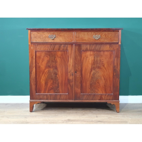 585 - A Victorian mahogany Cupboard, fitted frieze drawer and a pair of cupboard doors on bracket supports... 