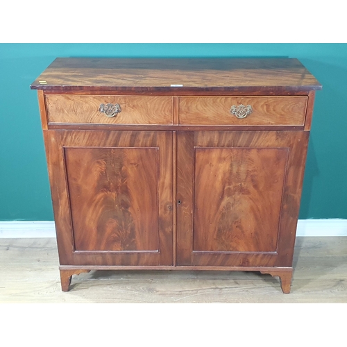 585 - A Victorian mahogany Cupboard, fitted frieze drawer and a pair of cupboard doors on bracket supports... 