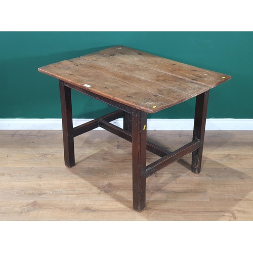 592 - An antique oak Table, the four plank top on square supports and H stretcher, 2ft 5