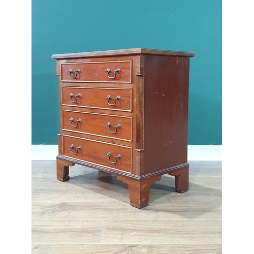 598 - A reproduction Chest of four long drawers on bracket feet, 2ft wide (R4)