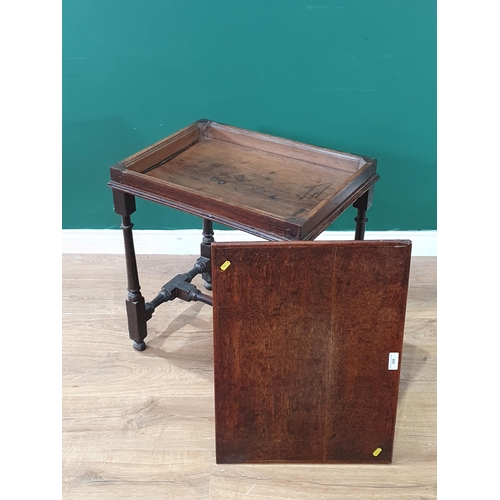 599 - An antique oak Side Table with later top, on turned and square supports and H stretcher and bun feet... 