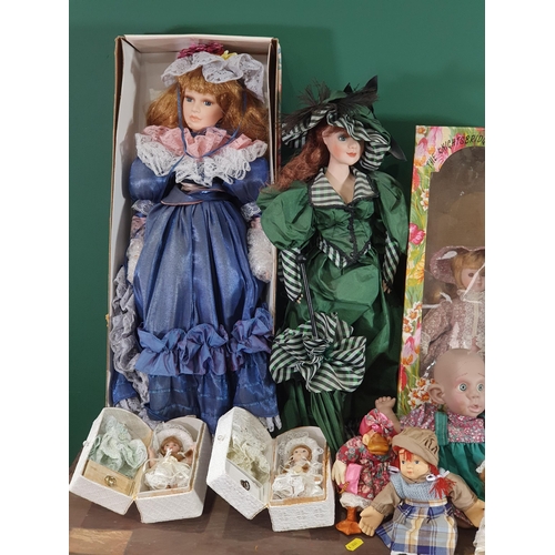 700 - A box of assorted Dolls including, two 