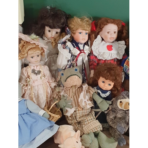 701 - A box of assorted Dolls including, a boxed Tuscany Porcelain Doll, a Leonardo Collection Boxed Doll,... 