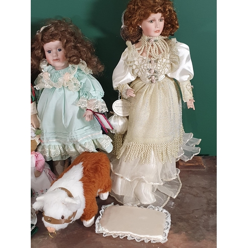 702 - A Box of modern Dolls (R8)