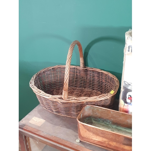 704 - A wicker Basket, two small wicker Pic-Nic Baskets, a copper Planter with lion mask handles, a modern... 