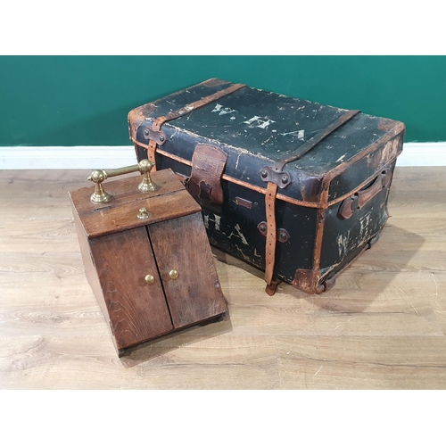 713 - An oak and brass handled Coal Scuttle with brass coat of arms, and a Vintage Luggage Case, A/F. (R8)... 