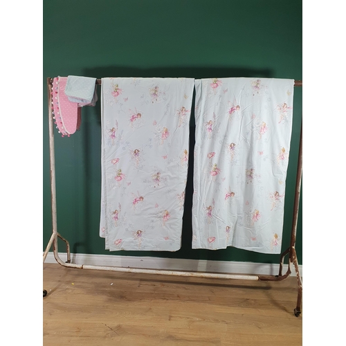 718 - A pair of pale blue/green Curtains with floral and fairy decorations, 7ft 9