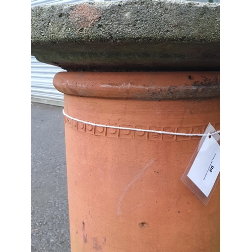 86 - A reconstituted Bird Bath resting on a terracotta Chimney Pot, and a rectangular galvanised Water Ta... 