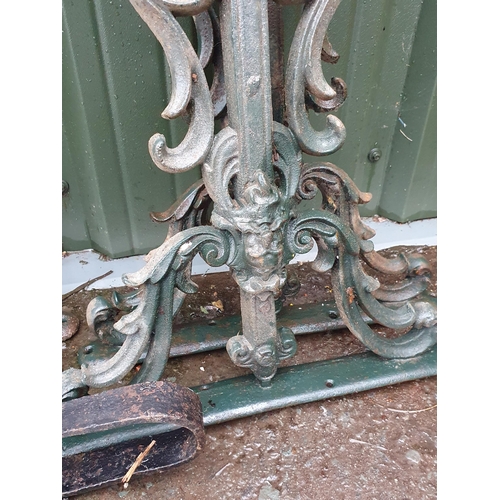 87 - Two pairs of green painted cast iron Table Ends, two Sways and two Pot Hangers