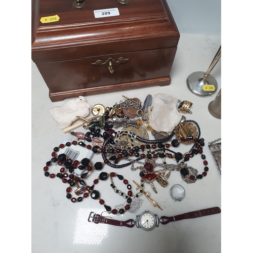 209 - A mahogany Tea Caddy containing silver Trumpet Vase, costume Jewellery etc