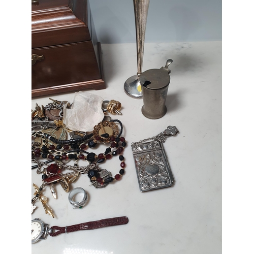 209 - A mahogany Tea Caddy containing silver Trumpet Vase, costume Jewellery etc