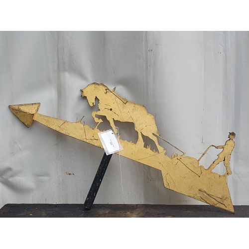 433 - A gold painted Weather Vane with a design of a figure ploughing with a horse, 3ft 7in W