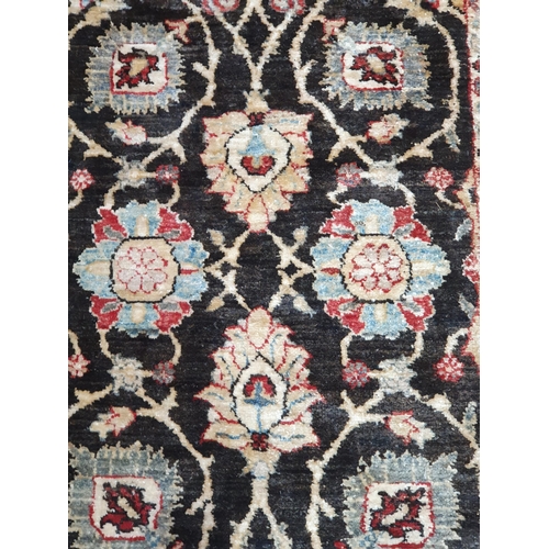 93 - A Runner on beige and brown ground, with multi borders and central floral designs, 9ft 11