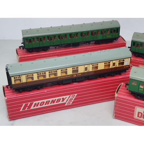 116 - A boxed Hornby Dublo 4150 S.R. Electric Driving Trailer Coach, 4081 S.R. Suburban Coach, 4082 S.R. S... 