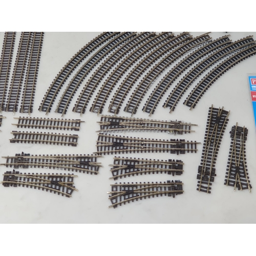 119 - A box of Peco N gauge Set Track including Straights, Curves, Points, Tidy Track Cleaner, Buffers, Ba... 