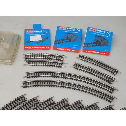 119 - A box of Peco N gauge Set Track including Straights, Curves, Points, Tidy Track Cleaner, Buffers, Ba... 