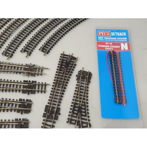 119 - A box of Peco N gauge Set Track including Straights, Curves, Points, Tidy Track Cleaner, Buffers, Ba... 