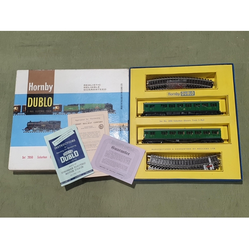 20 - A boxed Hornby Dublo 2050 Suburban Electric Train, unused, near perfect box. Neither power car or tr... 