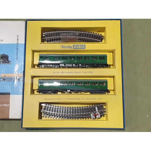 20 - A boxed Hornby Dublo 2050 Suburban Electric Train, unused, near perfect box. Neither power car or tr... 